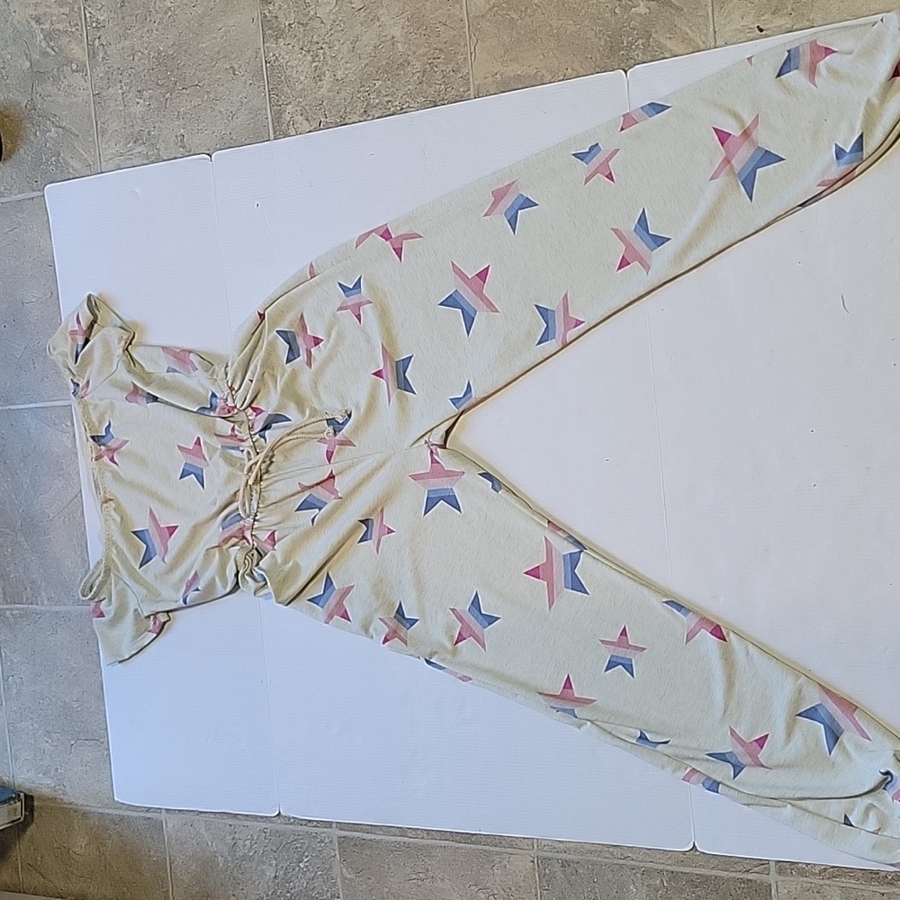 NWOT, Lovely Melody heathered beige multicolored star jumpsuit, M